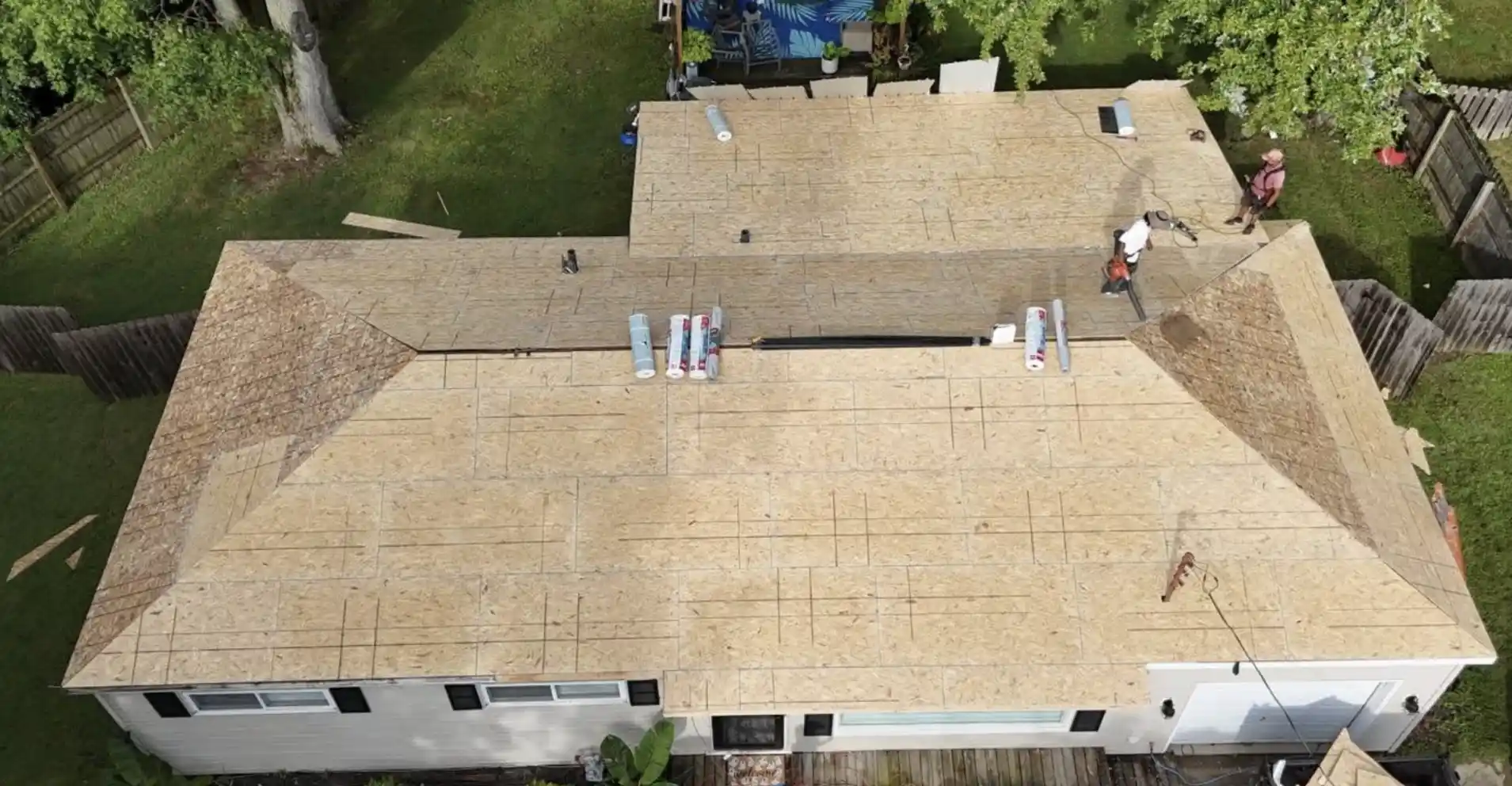 Before: Aerial view of exposed OSB decking during a project by our Roofing Contractor Bismarck ND.
